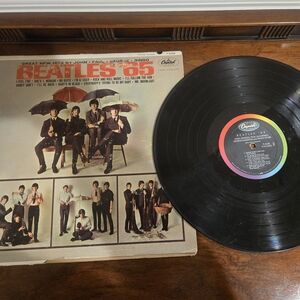 The Beatles Vintage Vinyl with Black and Red Cover